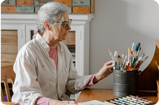 Older Woman Painting