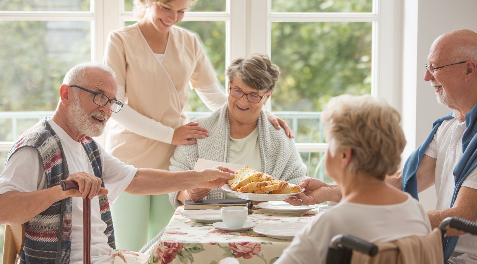 older-adults-enjoying-food-at-assisted-living-community