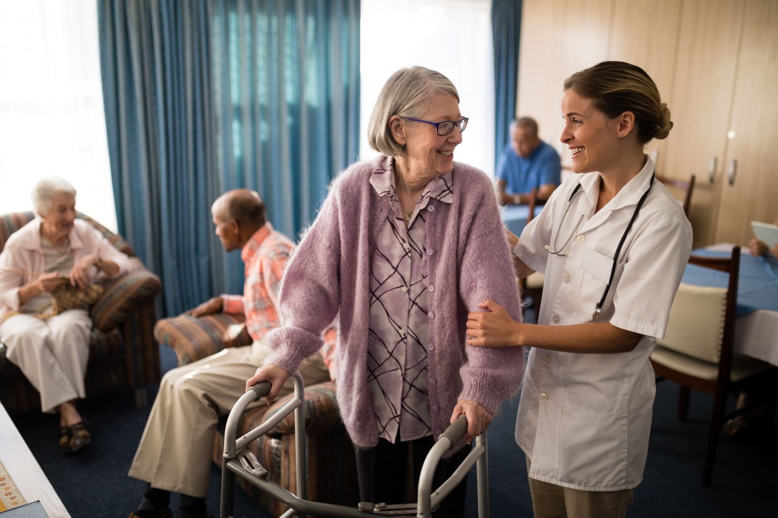 older-adult-and-nurse-at-nursing-home