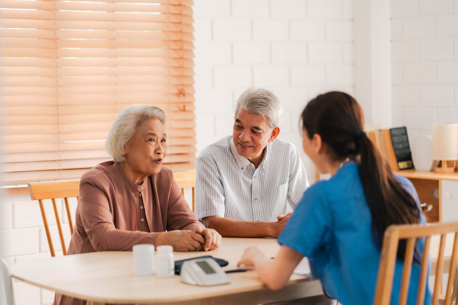Adults at a table talking
